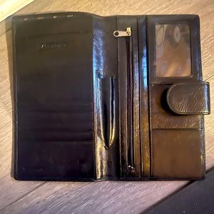 Black Mancini leather wallet and passport holder